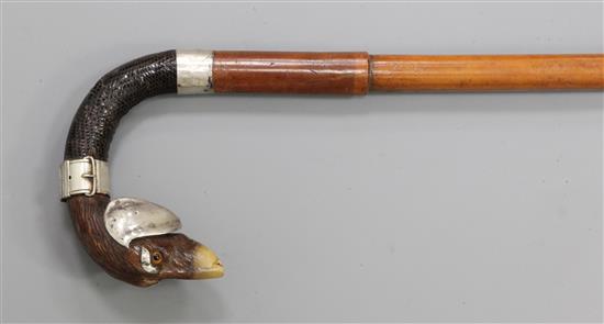 An Edwardian silver mounted horn and snakeskin walking stick, 37in.